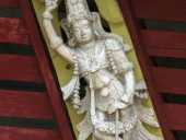 Sri Krishna holding the mountain Govardhana